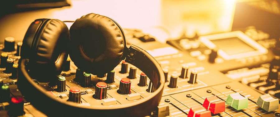 bigstock-Headphone-And-Sound-Mixer-In-S-454868353.jpg
