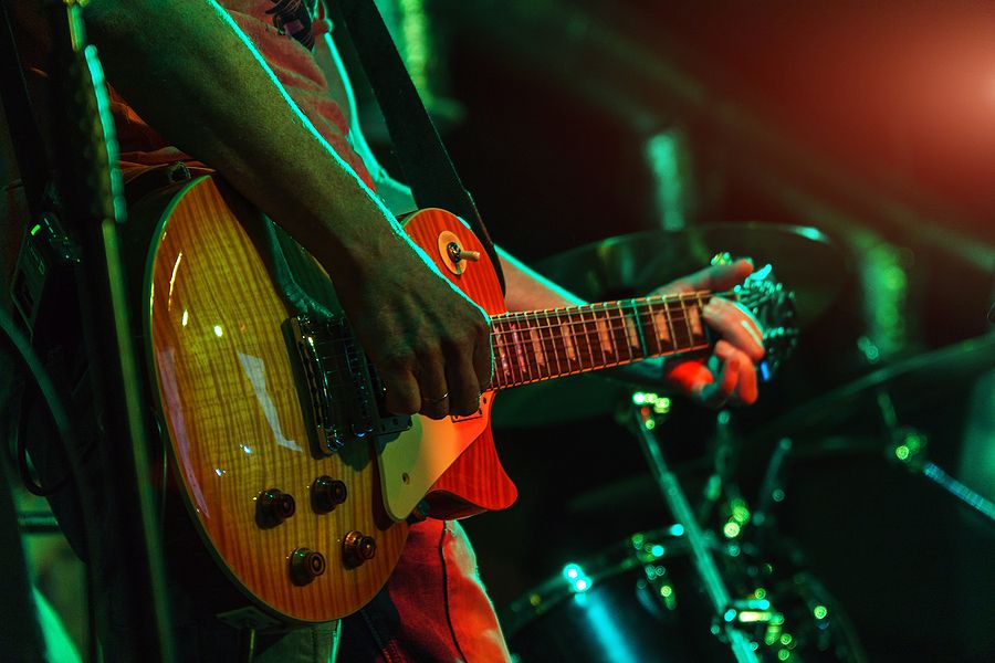 bigstock-The-Guitarist-Plays-The-Guitar-466831877.jpg